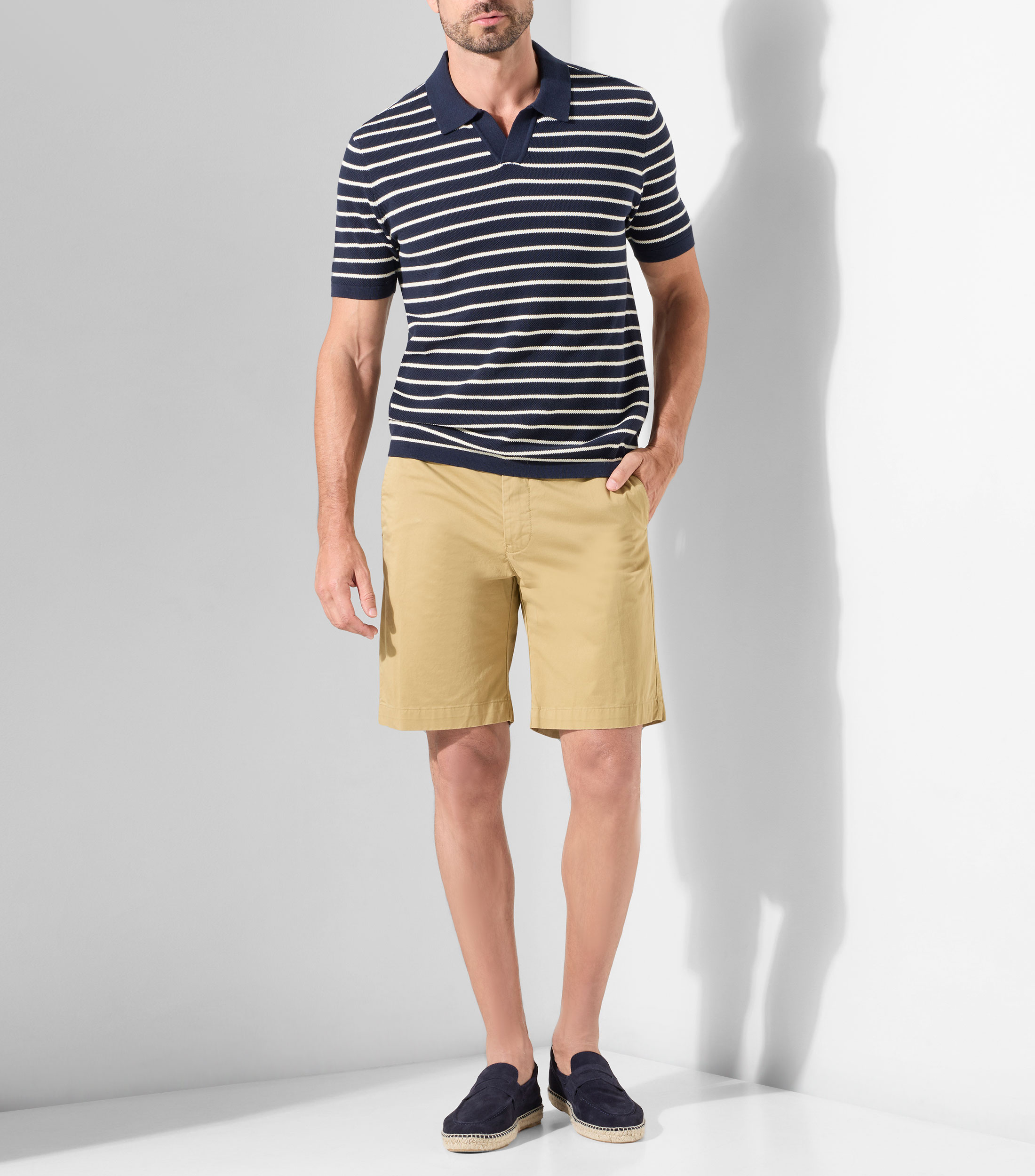 Playera tipo polo manga corta a rayas Hombre